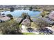 Panoramic aerial view of the community with lake and picturesque surroundings, showcasing the property's location at 781 Lakeworth Cir, Lake Mary, FL 32746