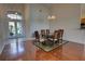 Bright dining room boasts hardwood floors and ample natural light at 781 Lakeworth Cir, Lake Mary, FL 32746