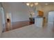 Spacious living room with hardwood floors and tile floors, ideal for Gathering gatherings and entertaining guests at 781 Lakeworth Cir, Lake Mary, FL 32746