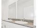 Dual vanity bathroom with granite countertops, undermount sinks at 792 Griffon Ave, Lake Alfred, FL 33850