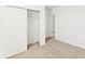 Bright bedroom includes convenient closet, door access at 792 Griffon Ave, Lake Alfred, FL 33850