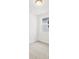 Bedroom features carpeting, natural light, and minimalist style at 792 Griffon Ave, Lake Alfred, FL 33850