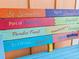 Colorful outdoor bench with vacation-themed sayings at 8086 Knee Deep Rd, Kissimmee, FL 34747