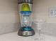 A blender and margarita glass sit on light quartz countertops at 8086 Knee Deep Rd, Kissimmee, FL 34747