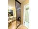 Bathroom includes vanity and storage with a mirrored closet at 9 Escondido Cir # 88, Altamonte Springs, FL 32701