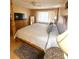 Bright bedroom features a four poster bed and furnishings at 9 Escondido Cir # 88, Altamonte Springs, FL 32701