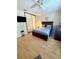 Cozy bedroom with a comfortable bed, ceiling fan, and warm lighting at 9 Escondido Cir # 88, Altamonte Springs, FL 32701