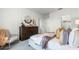Stylishly decorated bedroom boasts hardwood floors, modern furniture, and serene ambiance at 994 Lido Dr, Howey In The Hills, FL 34737
