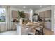 Stylish kitchen showcasing granite countertops, stainless steel appliances, and a functional center island with seating at 994 Lido Dr, Howey In The Hills, FL 34737