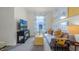 Cozy living room with plush seating, modern decor, and a sunlit window at 994 Lido Dr, Howey In The Hills, FL 34737