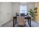 Bright office space featuring a large desk, ample natural light, and modern decor at 994 Lido Dr, Howey In The Hills, FL 34737