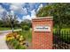 Sign at Oakland Park entrance with brick base and landscaping and a fire hydrant at 1073 Sadler Oaks Way, Winter Garden, FL 34787