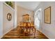 Bright dining room with a wooden table set, china cabinet, and large window at 1145 Lake Rogers Cir, Oviedo, FL 32765