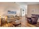 Comfortable living room featuring hardwood floors and neutral décor at 1145 Lake Rogers Cir, Oviedo, FL 32765