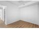Neutral bedroom featuring light wood flooring and base trim at 13037 Mulberry Park Dr # 529, Orlando, FL 32821