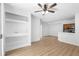 Bright living room with light wood flooring and a ceiling fan at 13037 Mulberry Park Dr # 529, Orlando, FL 32821