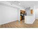 Open-concept living area with hardwood floors and bright lighting at 13037 Mulberry Park Dr # 529, Orlando, FL 32821