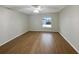 Bright bedroom with a ceiling fan, natural light, and vinyl wood flooring at 14200 Crystal Key Pl, Orlando, FL 32824