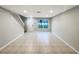 Spacious living room with tile flooring and plenty of natural light at 14200 Crystal Key Pl, Orlando, FL 32824