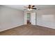 A bedroom featuring carpet, ceiling fan, and neutral walls at 16121 Sw 24Th Court Rd, Ocala, FL 34473