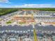 Extensive view of a modern residential development with multiple townhomes under construction at 2573 Reading Trl, Kissimmee, FL 34746