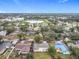 This aerial image showcases the neighborhood's proximity to a scenic lake and community amenities at 2805 Grassmere Ln, Orlando, FL 32808