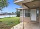 Outdoor patio area that flows from the house to the lawn, and offers room for outdoor seating at 2805 Grassmere Ln, Orlando, FL 32808