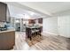 Modern kitchen features a center island with seating and stainless steel appliances at 2805 Grassmere Ln, Orlando, FL 32808