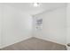 An empty bedroom with neutral carpet and one window at 3189 Viceroy Ct, Poinciana, FL 34759