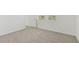 Bright bedroom with neutral carpet and windows providing natural light at 3189 Viceroy Ct, Poinciana, FL 34759