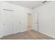 Bedroom featuring closet with sliding doors at 3189 Viceroy Ct, Poinciana, FL 34759