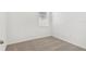 An empty bedroom with neutral carpet and one window at 3189 Viceroy Ct, Poinciana, FL 34759
