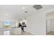Bright kitchen area with granite counters, stainless appliances, and seamless integration with living space at 3189 Viceroy Ct, Poinciana, FL 34759