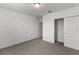 The bedroom has neutral carpet, white walls, and a closet at 3559 Broadwing Blvd, Poinciana, FL 34759