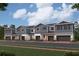 Modern townhome exteriors featuring two-story design, attached garages, white accents, and landscaped surroundings at 4307 Campsite Loop, Orlando, FL 32824