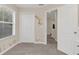 Inviting bedroom with closet, neutral paint and carpet, and butterfly wall decor at 5021 Sweet Leaf Ct, Altamonte Springs, FL 32714