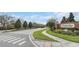 Camden Club neighborhood entrance with lush landscaping and brick signage at 5021 Sweet Leaf Ct, Altamonte Springs, FL 32714