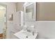 This bathroom features a mirror, sink, and medicine cabinet at 5073 Lake Howell Rd, Winter Park, FL 32792