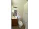 Small half bathroom with vanity, toilet, and tiled flooring at 510 Lavon Dr, Altamonte Springs, FL 32701