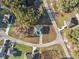 Aerial view of a home located on a cul-de-sac, surrounded by a lush neighborhood at 6430 Sw 145Th Ln, Ocala, FL 34473