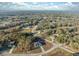 Overhead aerial view of a home nestled in a lush neighborhood at 6430 Sw 145Th Ln, Ocala, FL 34473