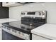 Close up of a stainless steel range and quartz countertops at 6430 Sw 145Th Ln, Ocala, FL 34473