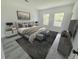 Airy main bedroom with a decorative rug, a bench, and a pair of windows at 6430 Sw 145Th Ln, Ocala, FL 34473