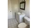 This bathroom features neutral tile, a shower-tub combo, and a single sink vanity at 709 Michigan Ct # 4, St Cloud, FL 34769