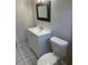 This bathroom features neutral tile, a shower-tub combo, and a single sink vanity at 709 Michigan Ct # 4, St Cloud, FL 34769