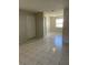 Interior view of a doorway leading into the living room and kitchen at 709 Michigan Ct # 4, St Cloud, FL 34769