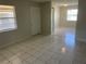 An interior view showing a front door and tile floor at 709 Michigan Ct # 4, St Cloud, FL 34769