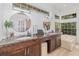 Bathroom with granite counters, dual sinks, and a luxurious soaking tub at 8121 Deville Ct, Orlando, FL 32817