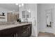 The bathroom has double sinks, granite countertops, and modern fixtures at 1012 Parma Cir, Lake Mary, FL 32746