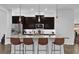 Modern kitchen with granite countertops, stainless steel appliances, and stylish lighting at 1012 Parma Cir, Lake Mary, FL 32746